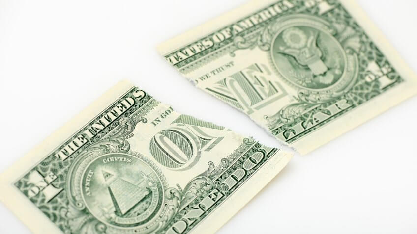 ripped US dollar bill