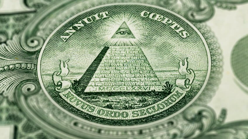 close up of US dollar bill pyramid