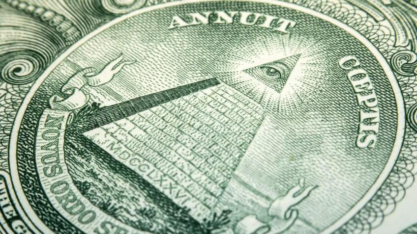 close up of US dollar bill pyramid