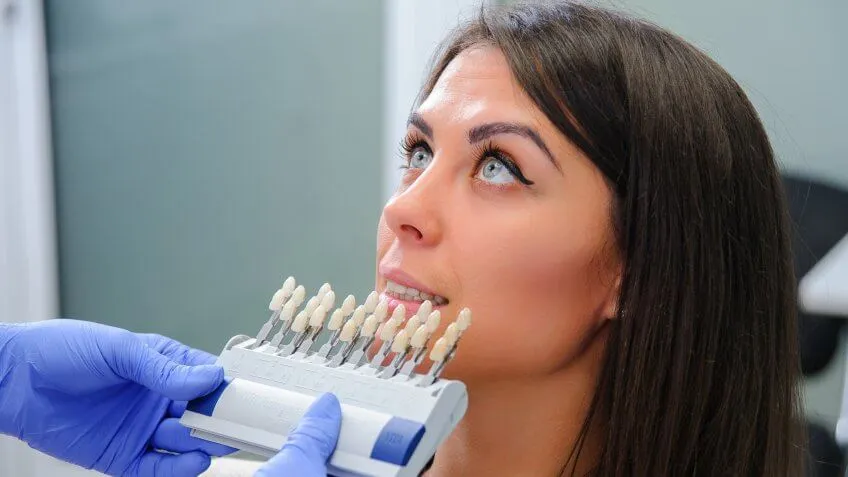 woman at the dentist getting dental implants