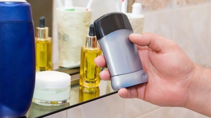 someone picking up deodorant