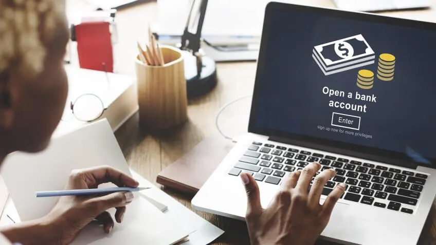 person about to open a bank account on their laptop
