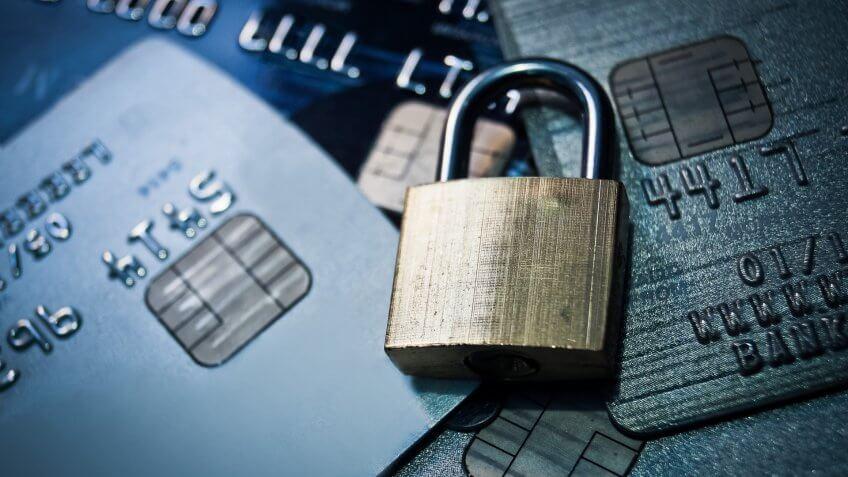 padlock on a stack of credit cards