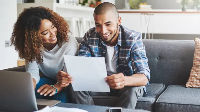couple going through their paperwork together at home