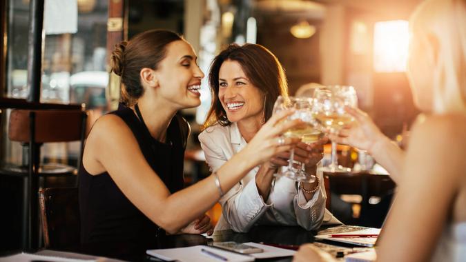 business people relaxing after work in a cafe