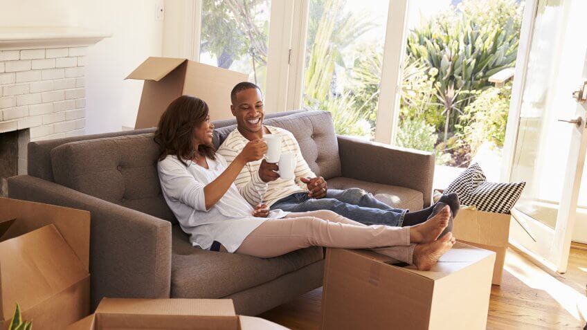 young couple moving into a new home