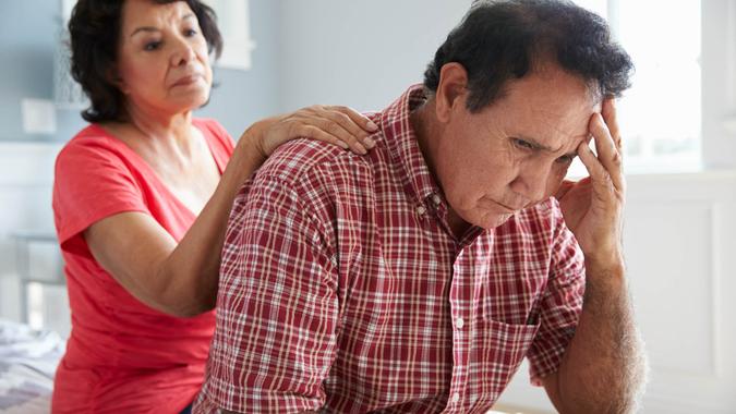 You're Concerned Social Security Will Disappear Wife Comforting Senior Husband Suffering With Dementia.
