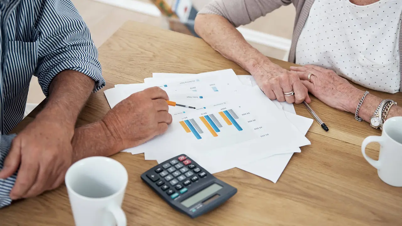 Cropped shot of a senior couple reviewing their financial investmentshttp://195.