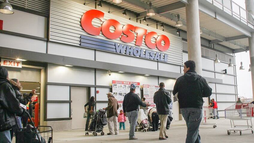 NEW YORK - NOVEMBER 13: Shoppers enter a recently opened Costco warehouse store on November 13, 2009 in New York City.