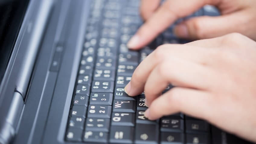 101 Money-Making Skills You Can Learn in Less Than a Year, closeup business woman typing on computer., finger at laptop keyboard. working lifestyle