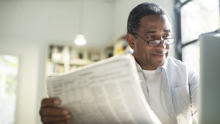 senior adult checking news