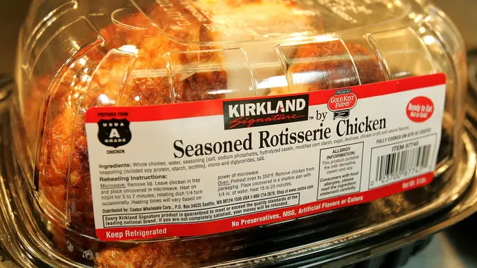 NILES, IL - JUNE 16:  A Kirkland Signature premium brand roasted rotisserie chicken sits at a Costco store June 16, 2005 in Niles, Illinois.