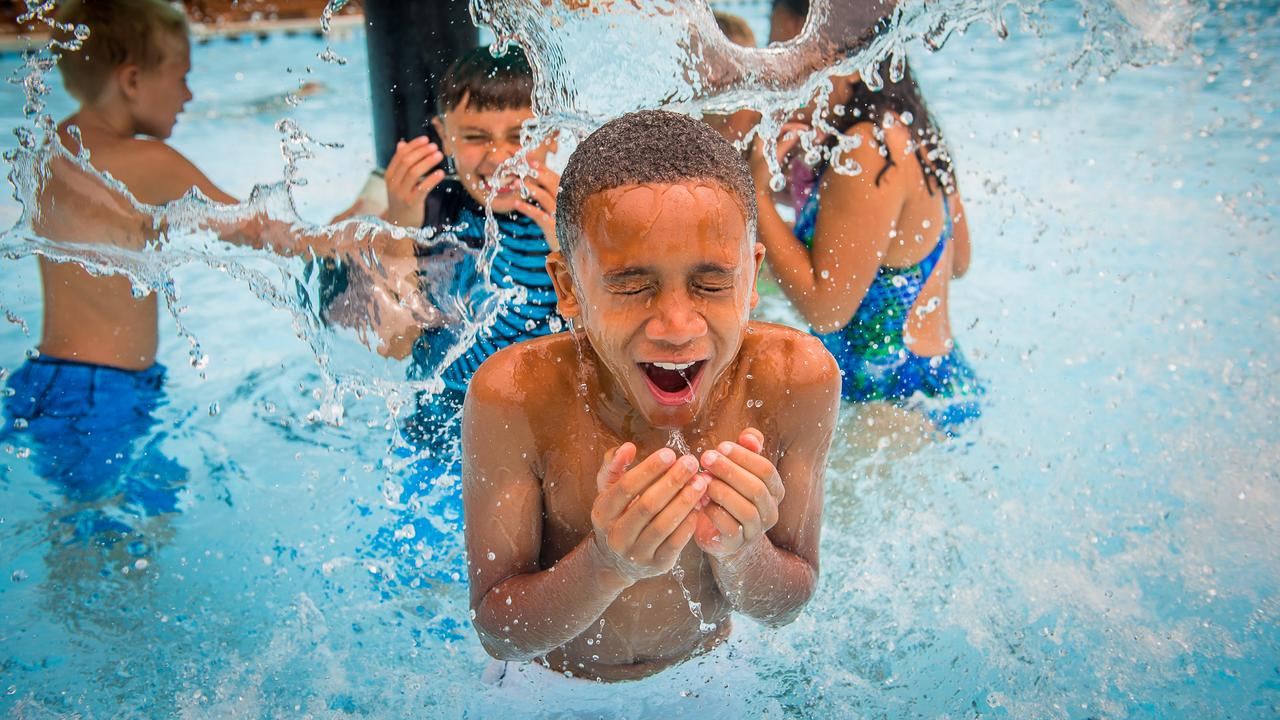 Children splash and play in the waters of Rock ÔNÕ Roll Island at Water Country USA¨.