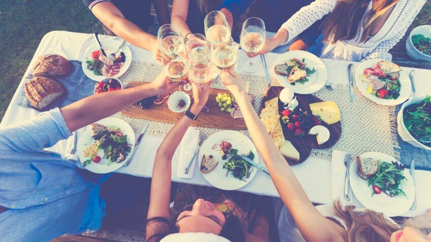 friends having party with foldable table