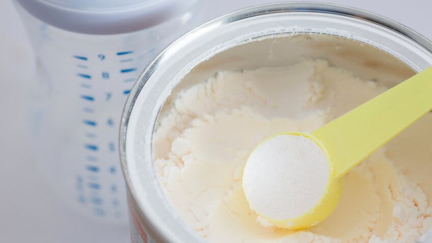 Milk powder for baby in measuring spoon on can., Things that are always cheaper at Costco