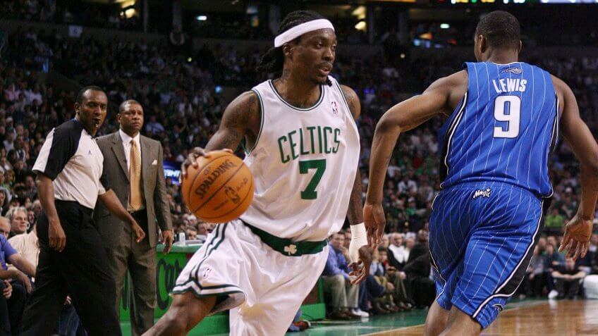 BOSTON - NOVEMBER 20: Marquis Daniels #7 of the Boston Celtics drives to the basket around Rashard Lewis #9 of the Orlando Magic during the game on November 20, 2009 at the TD Garden in Boston, Massachusetts.