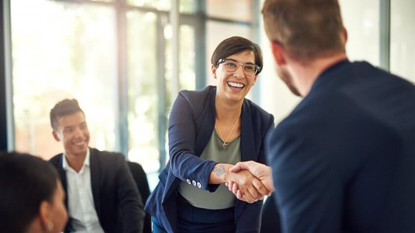 Shot of a group of businesspeople meeting in the boardroom.