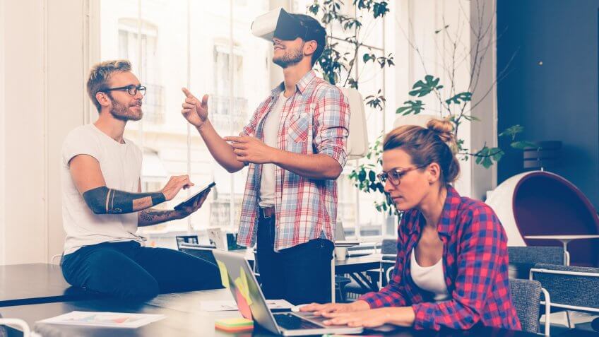 96 Money-Making Skills You Can Learn in Less Than a Year, 3d, Adult, Business, Businessman, Businesspeople, Businesswoman, Colleague, Coworker, Desk, Entrepreneur, Entrepreneurship, Equipment, Experience, Gesturing, Illusion, New, Office, Reality, Start-up, Team, Teamwork, VR, Virtual, Worplace, augmented, cooperation, creative, designer, developers, development, device, enjoying, experiment, france, future, games, goggles, headset, indoors, man, men, people, programmer, simulator, startup, testing, togetherness, woman, young