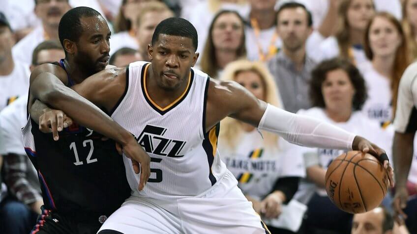 SALT LAKE CITY, UT - APRIL 23: Joe Johnson #6 of the Utah Jazz tries to drive past the defense of Luc Mbah a Moute #12 of the Los Angeles Clippers in the second half of the 105-98 win by the Jazz in Game Four of the Western Conference Quarterfinals during the 2017 NBA Playoffs at Vivint Smart Home Arena on April 23, 2017 in Salt Lake City, Utah.