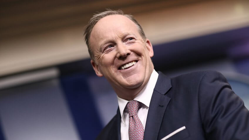 WASHINGTON, DC - MAY 12: White House Press Secretary Sean Spicer listens to National Security Advisor H.