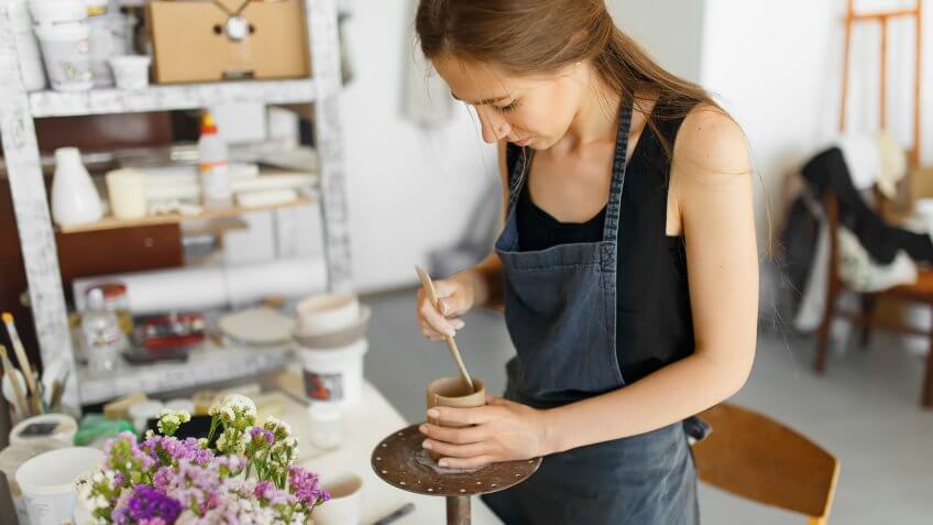 woman crafting with clay