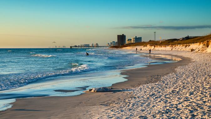 Beach scene in Panama City Beach Florida at sunset.