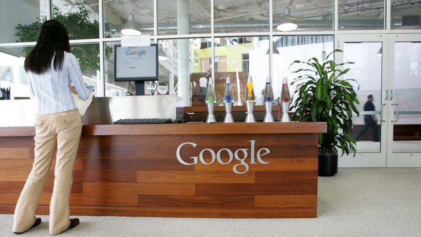 MOUNTAIN VIEW, CA - MAY 11: A Google employee stands in a lobby at the Googleplex May 11, 2006 in Mountain View, California.
