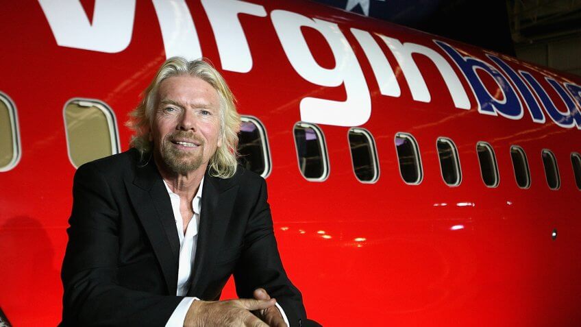 MELBOURNE, AUSTRALIA - SEPTEMBER 12: Sir Richard Branson celebrates Virgin Blue's 10th Anniversary in Australia at Melbourne Airport on September 12, 2010 in Melbourne, Australia.
