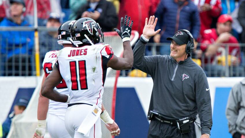 NASHVILLE, TN - OCTOBER 25: Head Coach Dan Quinn celebrates with Julio Jones #11 of the Atlanta Falcons after a touchdown against the Tennessee Titans at Nissan Stadium on October 25, 2015 in Nashville, Tennessee.