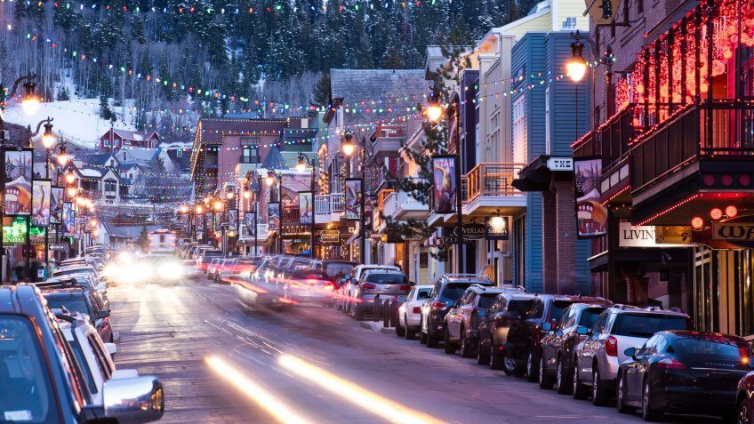 Long exposure of cars driving down Main St.