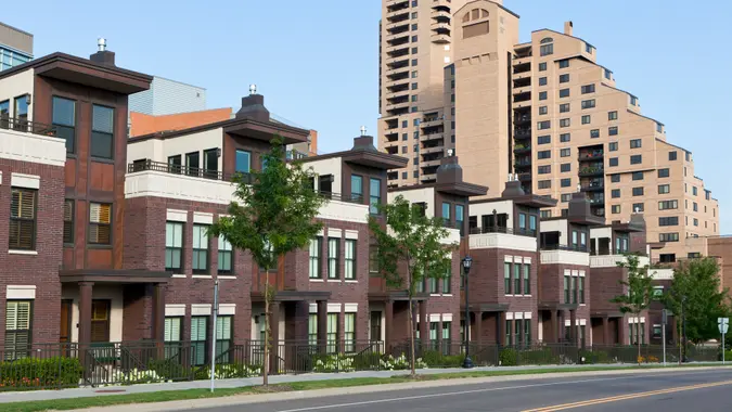 "Modern Apartment Buildings-a row of  modern townhouses and a highrise apartment in the city; Minneapolis,Minnesota Check out my Minneapolis Lightbox with more images:".