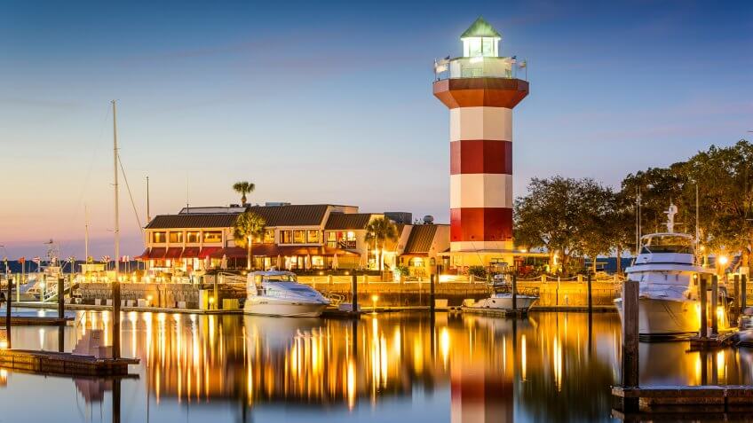 Hilton Head, South Carolina, USA lighthouse on the coast at twilight.