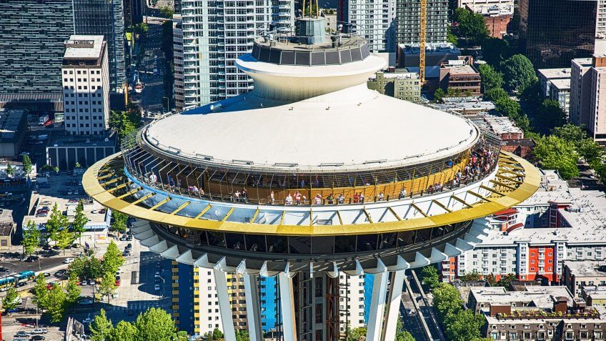 Seattle, United States - June 6, 2016: Tourists crowded atop the observation deck of the Space Needle on a warm summer afternoon.