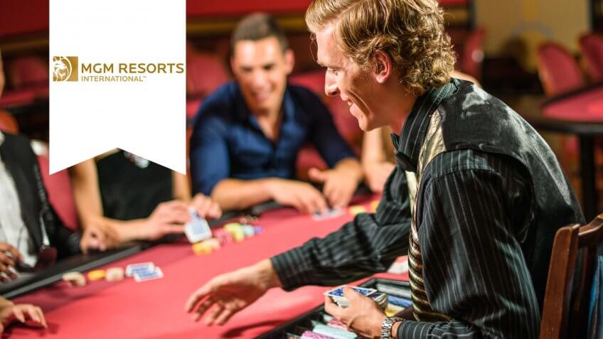 Friends playing at poker at Casino.