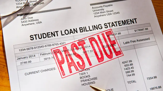 Statement for a Student Loan on a desktop.