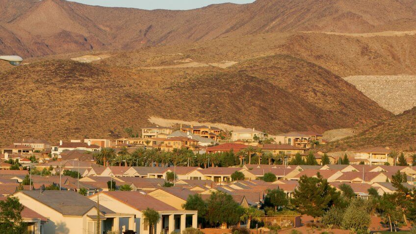 HENDERSON, NV - JUNE 30: Custom homes are being built on hillsides at the MacDonald Highlands community on the southern end of Henderson, on June 30, 2005 in Henderson, Nevada.