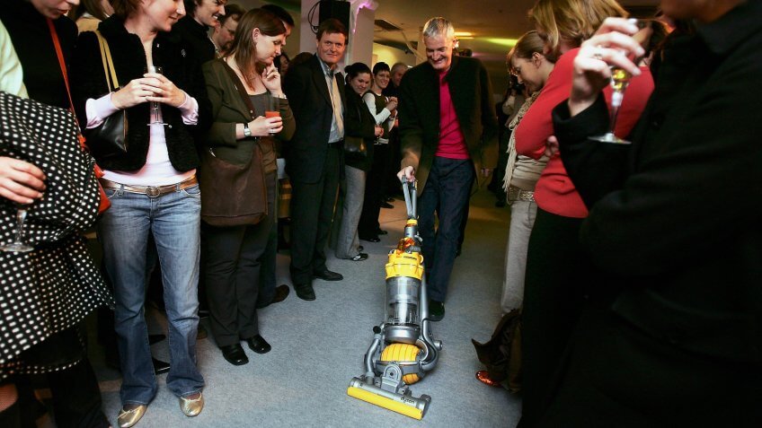 LONDON - MARCH 14: Inventor James Dyson demonstrates his latest hoovering invention on March 14, 2005 in London.
