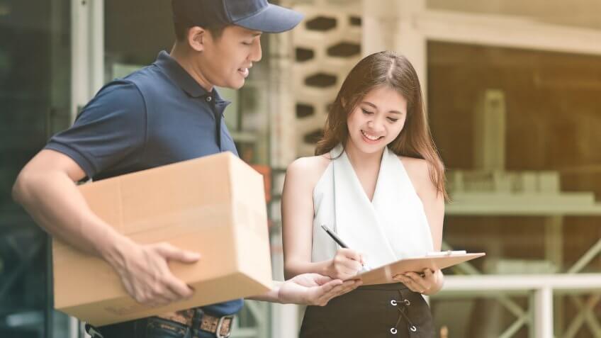 woman receiving free shipping package