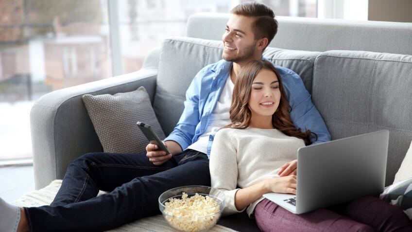 watching TV and laptop.