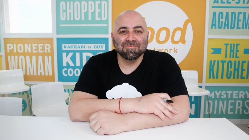 MIAMI BEACH, FL - FEBRUARY 22: Chef Duff Goldman signs books at the KitchenAid Culinary Demonstrations during the 2015 Food Network & Cooking Channel South Beach Wine & Food Festival presented by FOOD & WINE at Grand Tasting Village on February 22, 2015 in Miami Beach, Florida.