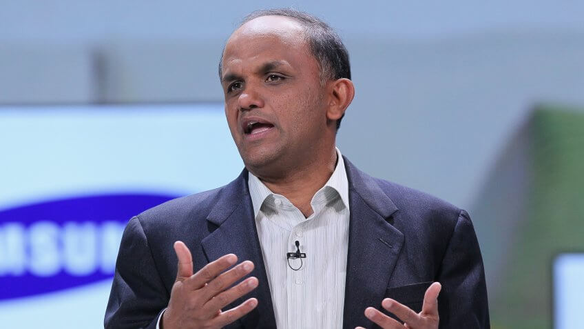LAS VEGAS - JANUARY 06: Adobe CEO Shantanu Narayen speaks during a keynote address by Samsung President and General Manager of Visual Display Business Boo-Keun Yoon at the 2011 International Consumer Electronics Show at the Las Vegas Hilton January 6, 2011 in Las Vegas, Nevada.