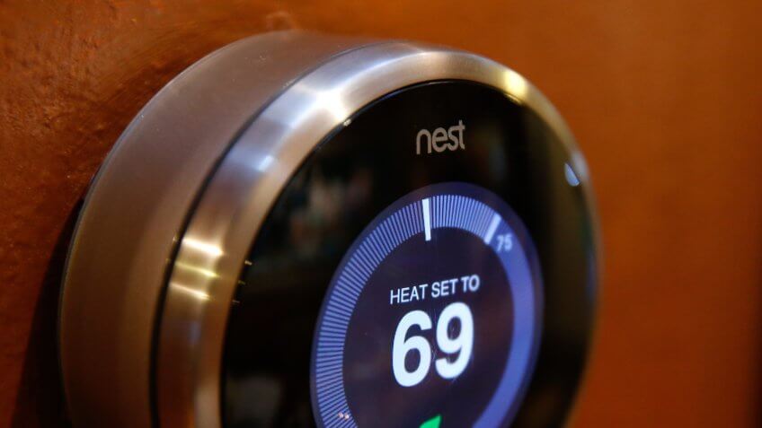 PROVO, UT - JANUARY 16: In this photo illustration, a Nest thermostat installed in a home is seen on January 16, 2014 in Provo, Utah.