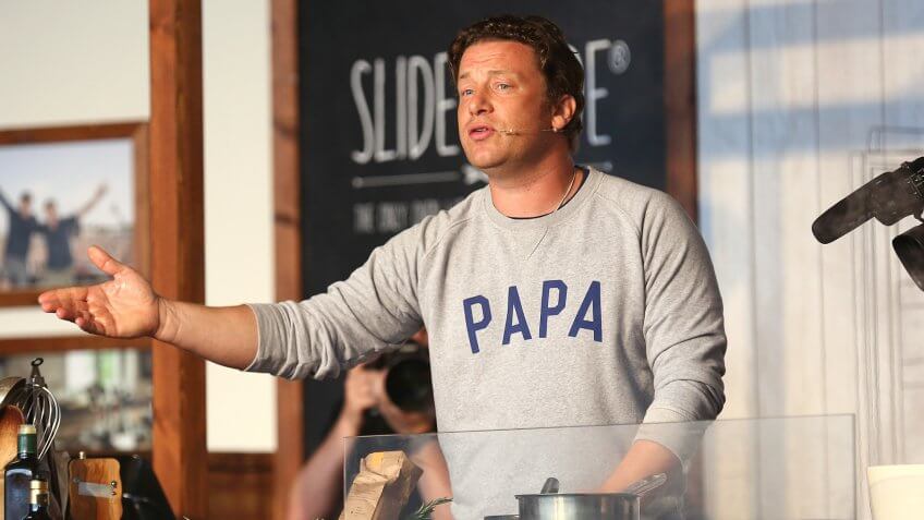 KINGHAM, OXFORDSHIRE - AUGUST 27: Jamie Oliver attends a cooking demonstration at the Neff Big Kitchen on day two of The Big Feastival at Alex James' Farm on August 27, 2016 in Kingham, Oxfordshire.