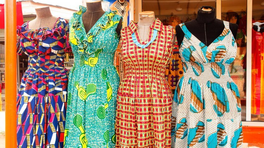 Dresses at an outdoor market in Accra Ghana West Africa.