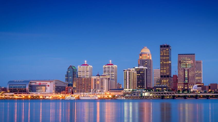 looking across the river just after sunset at the Louisville, Kentucky skyline.