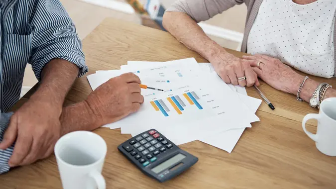 Cropped shot of a senior couple reviewing their financial investmentshttp://195.