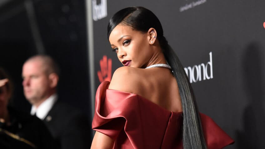 BEVERLY HILLS, CA - DECEMBER 11: Recording artist Rihanna attends Rihanna's First Annual Diamond Ball at The Vineyard on December 11, 2014 in Beverly Hills, California.