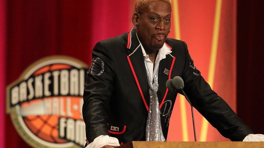 SPRINGFIELD, MA - AUGUST 12: Dennis Rodman gestures during the Basketball Hall of Fame Enshrinement Ceremony at Symphony Hall on August 12, 2011 in Springfield, Massachusetts.