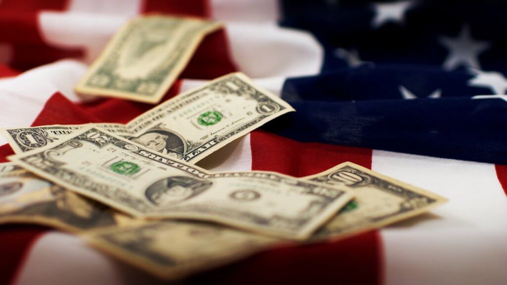 MAIN-stars-and-stripes-with-dollar-bills-of-the-USA-Flag-dizain-shutterstock_42105244-1024x576.jpg
