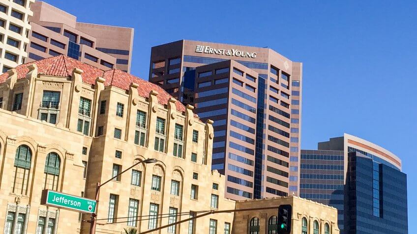 PHOENIX, AZ - FEBRUARY 8, 2016: Bank and financial institution skyscrapers rising above Cesar Chavez Memorial Plaza at Jefferson Street in Phoenix, Arizona.